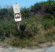 Now take a left on to dirt to get to bike path parking