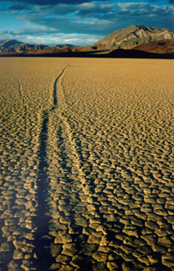 Rock with path trailing behind