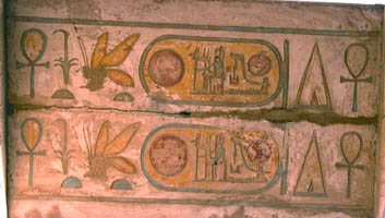 Painted Hieroglyphics under stone connecting two pillars