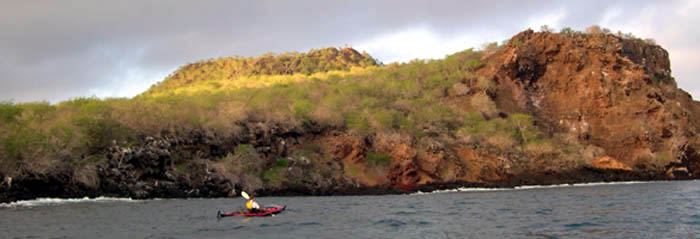 Paul kayaking by the coastline