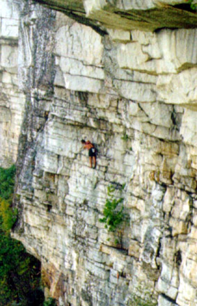 A closeup of the climber in the image on the left