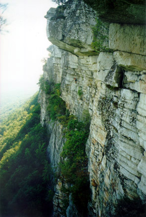 A climber contemplates the traverse<br>on Moonlight (hint: climber is above the treeline)