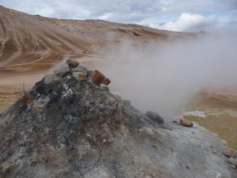 A pile of rocks lets eye watering steam out