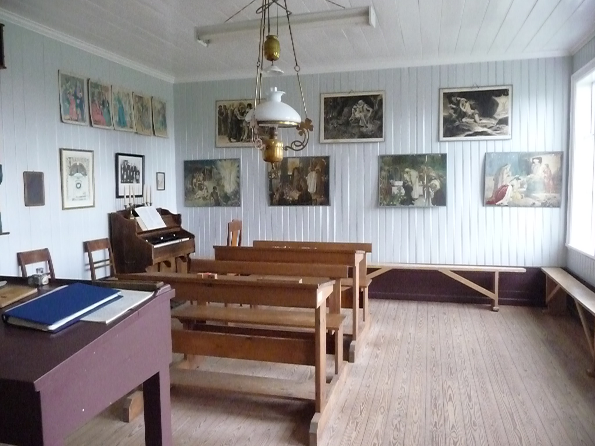 The schoolhouse: Inside the schoolroom.