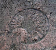 Round carving in floor at the Shrine of Mithras