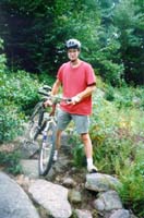 Bill holding bike