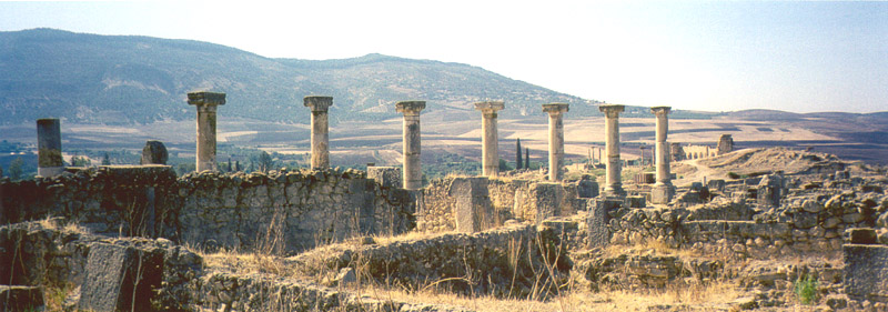 pillars with the mountains in the background