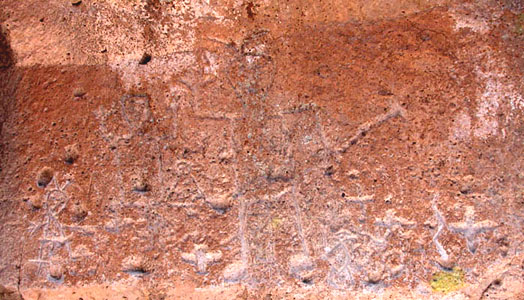 a wall of petroglyphs