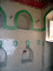 Painted walls with inset shelves in a home