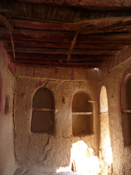 Inset cubby shelves in a mudbrick home