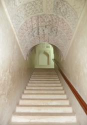 Stairwell with carved verses from the Koran