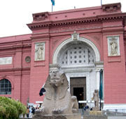 Sphynx statue in front of the pink museum