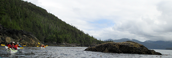 Paddling between rocks