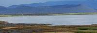 View of volcanic cone over the lake