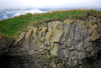 Rock cliff  in front of glacier