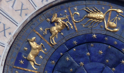 Clock with blue face and gold stars